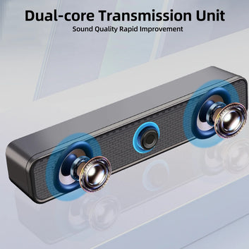 PC soundbar connected to laptop desktop setup